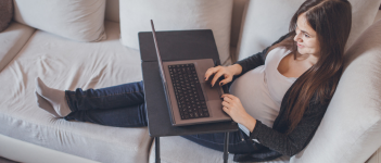 Pregnant Woman On A Sofa